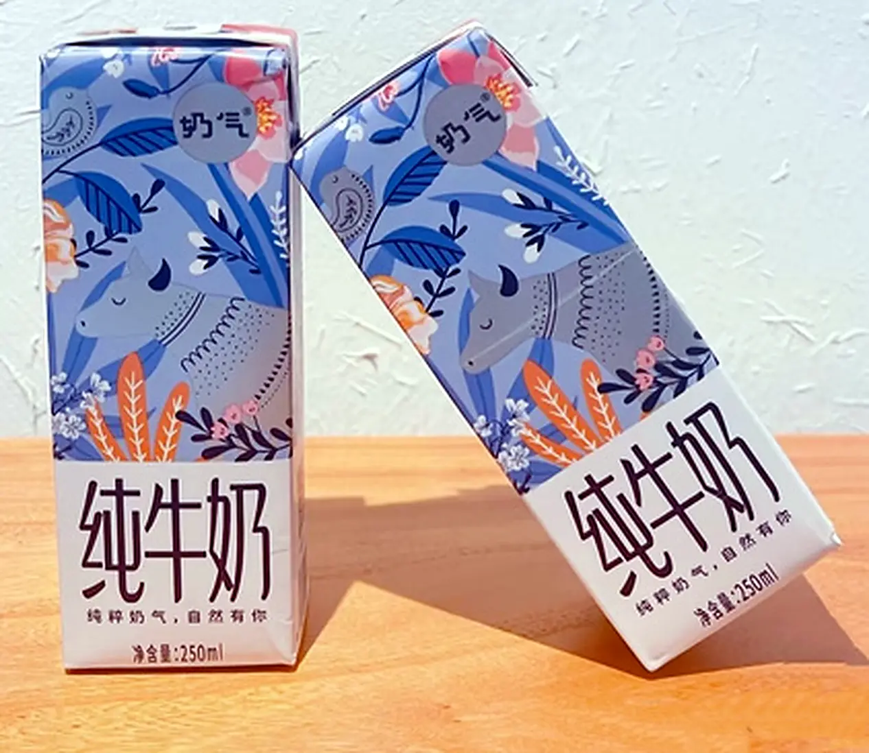 Blue illustrated packaging concept for the milk brand